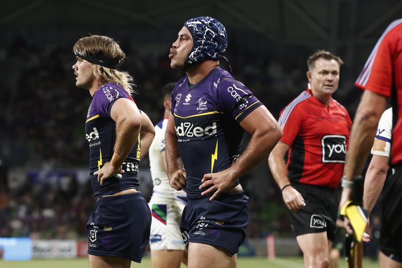 MELBOURNE, AUSTRALIA - MARCH 16: Jahrome Hughes of the Storm reacts after tackling Marcelo Montoya of the Warriors to prevent a try to New Zealand during the round two NRL match between Melbourne Storm and New Zealand Warriors at AAMI Park, on March 16, 2024, in Melbourne, Australia. (Photo by Daniel Pockett/Getty Images)