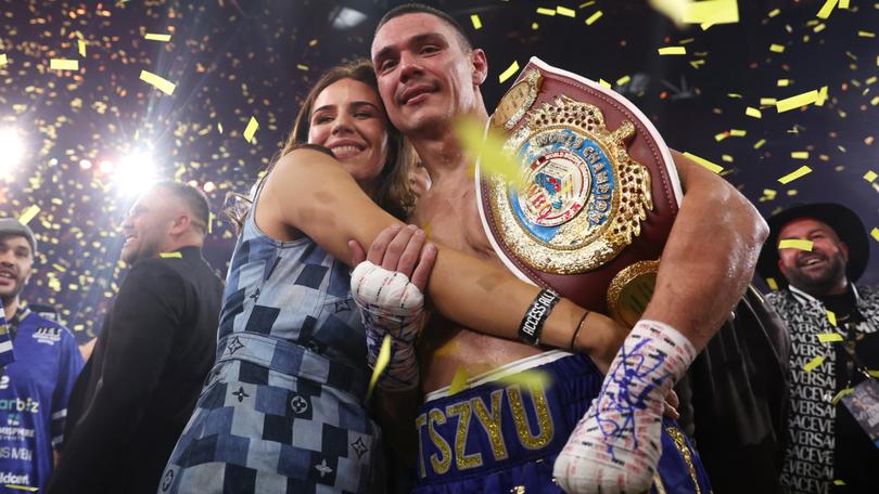 Tim Tszyu celebrates victory in the WBO super-welterweight world title fight after defeating Tony Harrison in Sydney last year.