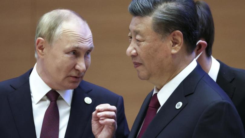 Vladimir Putin and Xi Jinping