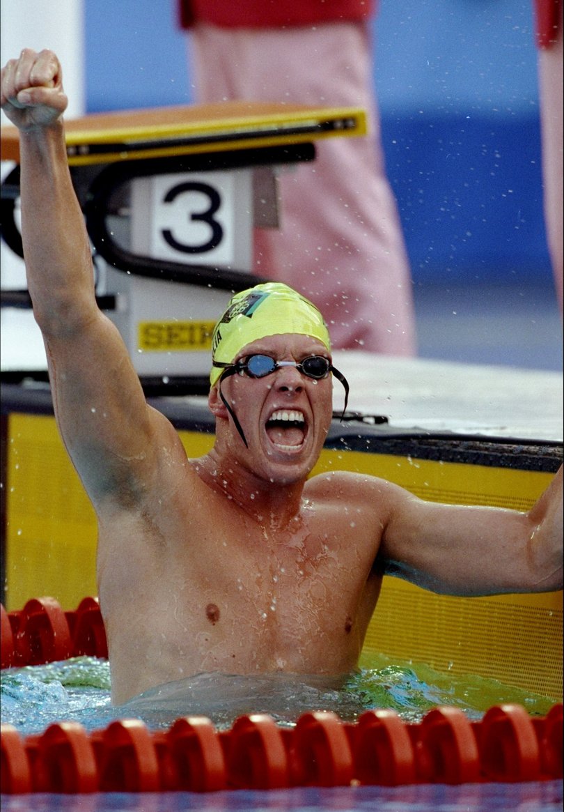 1992: Kieren Perkins of Australia celebrates winning the 1500m Freestyle event at the Olympic Games in Barcelona, Spain. (Photo by Bob Martin/Getty Images)