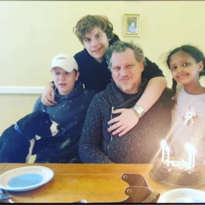Robert Pether with his children Flynn, Oscar and Nala.
