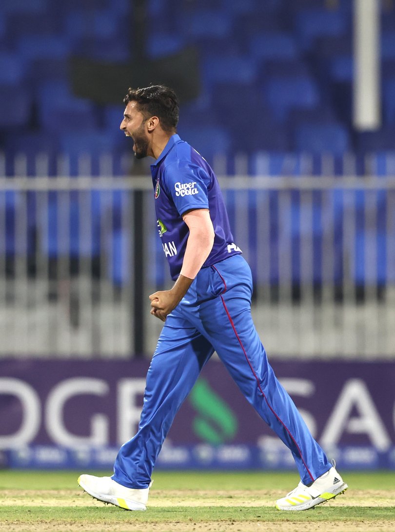 SHARJAH, UNITED ARAB EMIRATES - MARCH 18: Azmatullah Omarzai of Afghanistan celebrates after dismissing Harry Tucker of Ireland  during the Men's Twenty20 International match between Afghanistan and Ireland on March 18, 2024 in Sharjah, United Arab Emirates. (Photo by Francois Nel/Getty Images)