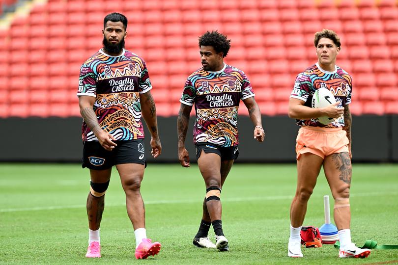 BRISBANE, AUSTRALIA - MARCH 11: (L-R) Payne Haas, Ezra Mam and Reece Walsh are seen during a Brisbane Broncos NRL training session at Suncorp Stadium on March 11, 2024 in Brisbane, Australia. (Photo by Bradley Kanaris/Getty Images)