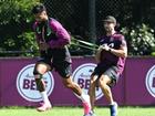 Broncos prop Payne Haas (left) goes through his paces at training on Wednesday. (Darren England/AAP PHOTOS)