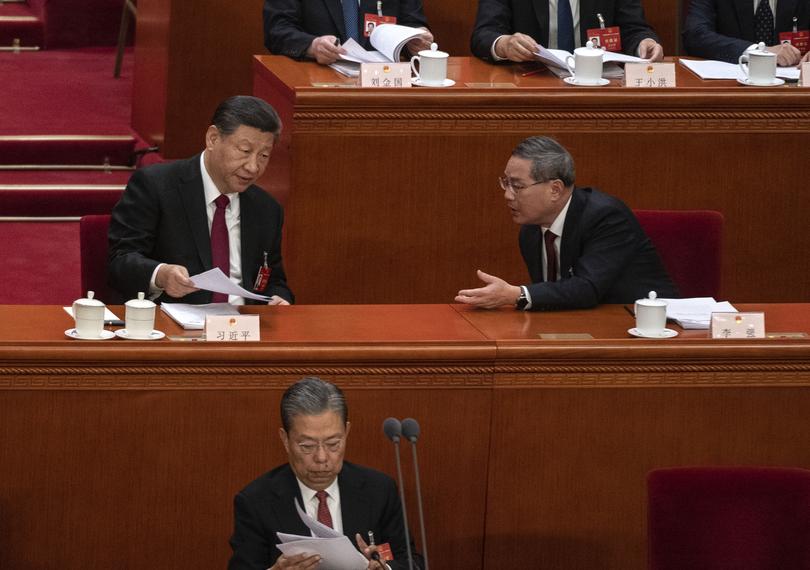 Chinese President Xi Jinping, left, with Premier Li Qiang.