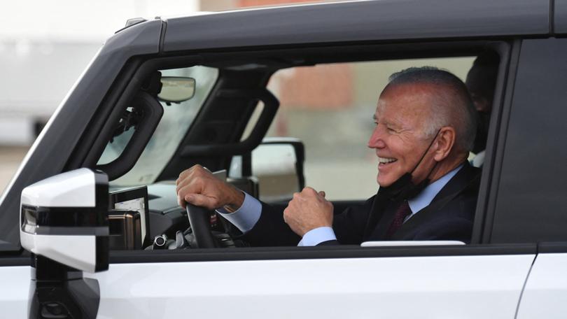 US President Joe Biden test drives an electric hummer as he tours the General Motors Factory ZERO electric vehicle assembly plant in Detroit.