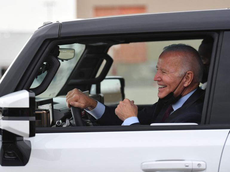 US President Joe Biden test drives an electric hummer as he tours the General Motors Factory ZERO electric vehicle assembly plant in Detroit.