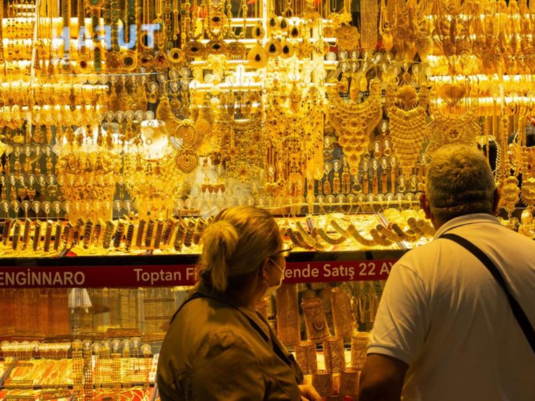 People browsing gold jewelry in Istanbul.