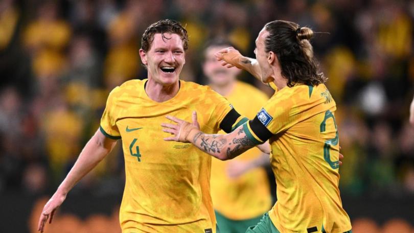 The versatile Kye Rowles is all smiles after scoring his first goal for Australia. (Dan Himbrechts/AAP PHOTOS)