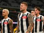 Collingwood's players looking glum after their defeat by the Saints at the MCG made it a 0-3 start. (Morgan Hancock/AAP PHOTOS)