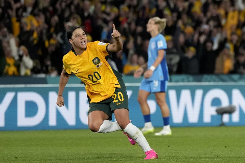 Sam Kerr celebrates after scoring during the Women's World Cup semifinal soccer match between Australia and England.