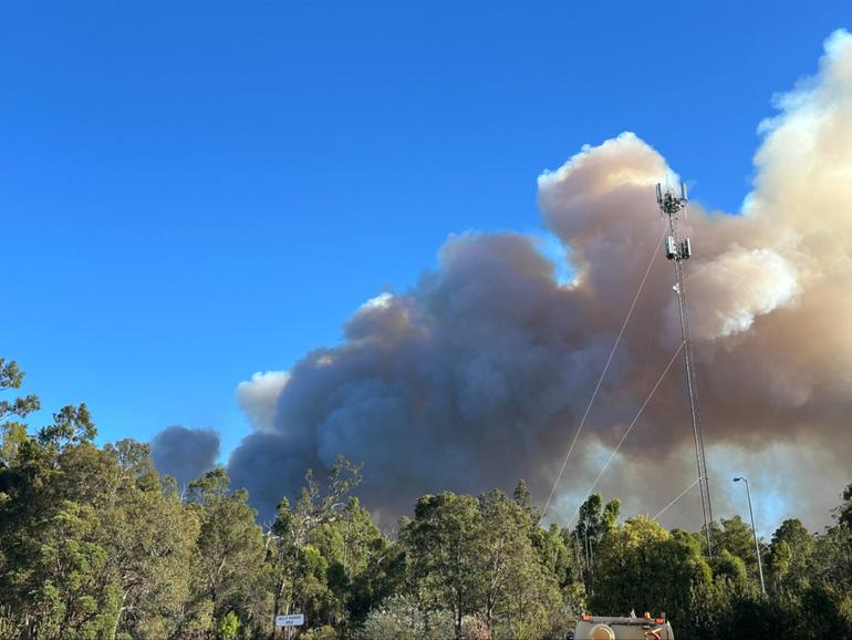 A suspicious bushfire in Perth’s south east has been downgraded to a watch and act alert almost 10 hours after the raging blaze was first reported. 

