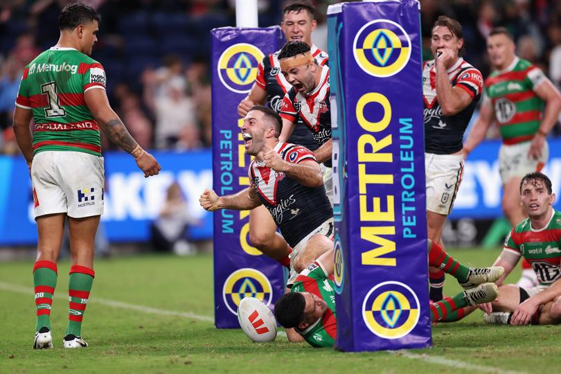 James Tedesco scores a try.