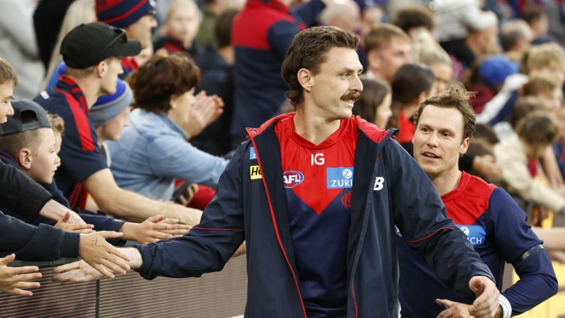 Jake Lever acknowledges fans after the win. 