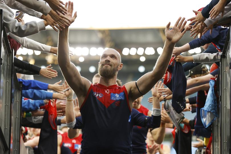 Max Gawn leads the team off the ground.