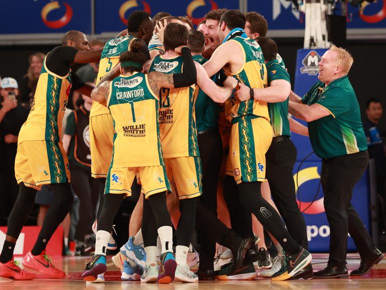 Tassie celebrate their win.