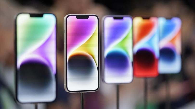 New iPhone 14 models on display at an Apple event on the campus of Apple's headquarters in Cupertino, Calif., Wednesday, Sept. 7, 2022. (AP Photo/Jeff Chiu)