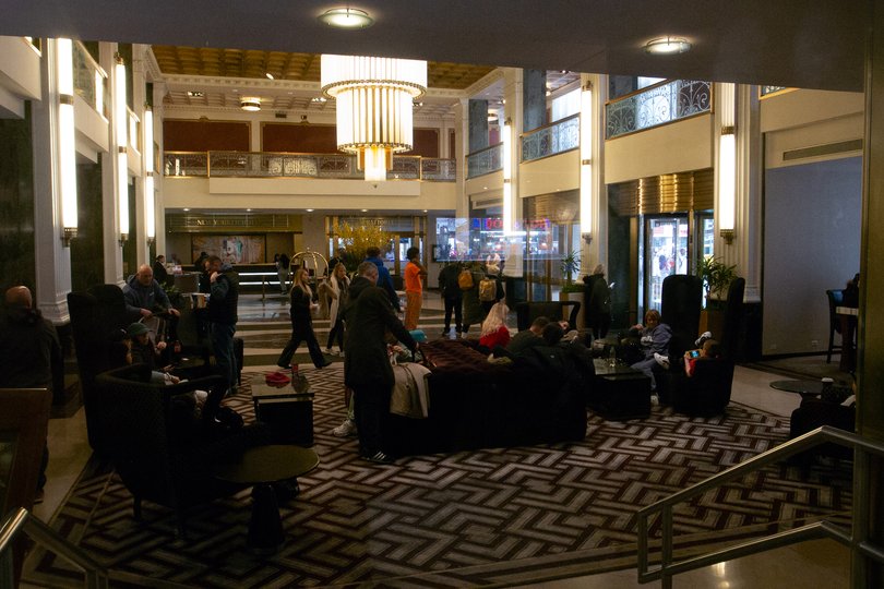 Guests in the lobby of the New Yorker Hotel, in Midtown Manhattan, on Feb. 27, 2024.