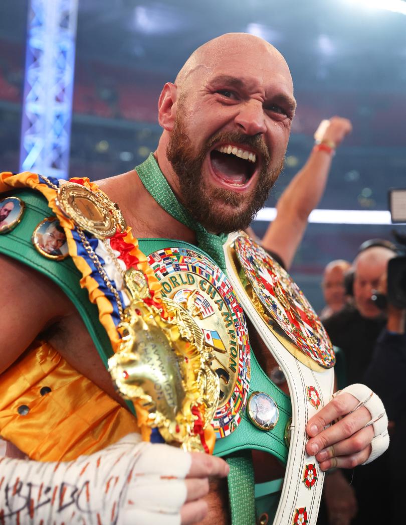 LONDON, ENGLAND - APRIL 23: Tyson Fury celebrates victory after the WBC World Heavyweight Title Fight between Tyson Fury and Dillian Whyte at Wembley Stadium on April 23, 2022 in London, England. (Photo by Julian Finney/Getty Images)