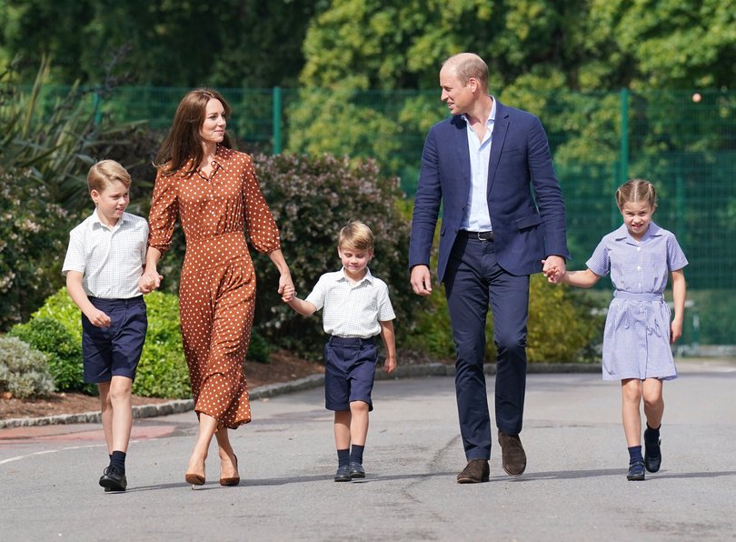 Kate with William and their children George, Louis and Charlotte. 