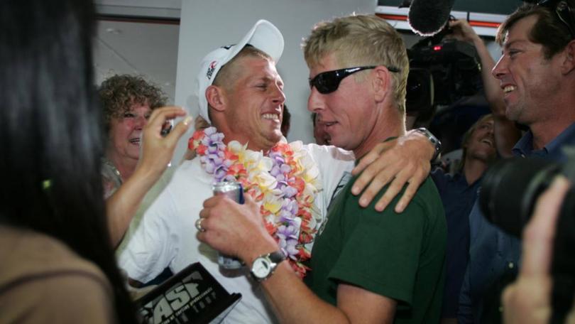 Former World Surfing Champ Mick Fanning (green shirt) with Brother Edward in 2007. 