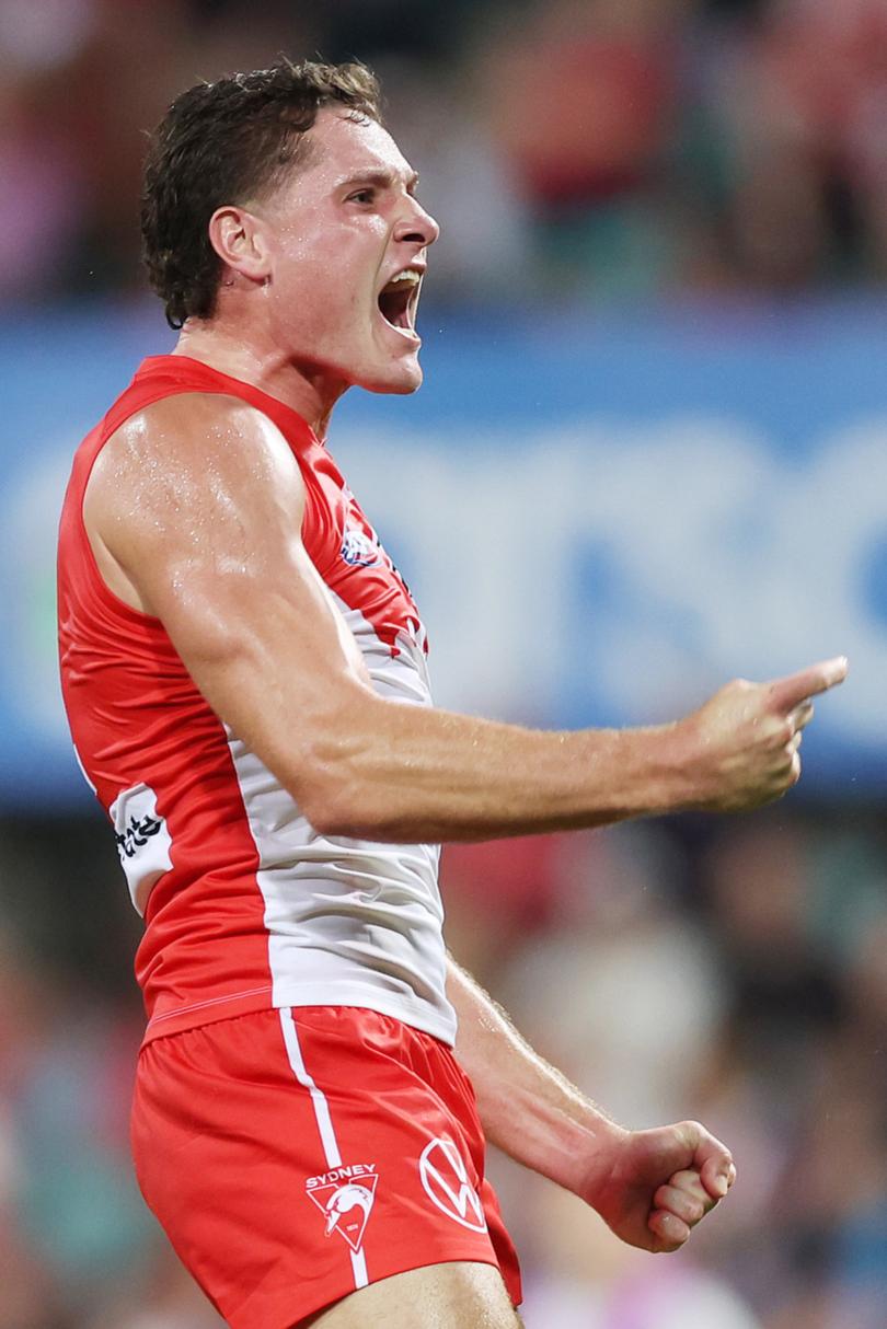 SYDNEY, AUSTRALIA - MARCH 23: Hayden McLean of the Swans celebrates kicking a goal during the round two AFL match between Sydney Swans and Essendon Bombers at SCG, on March 23, 2024, in Sydney, Australia. (Photo by Mark Metcalfe/AFL Photos/via Getty Images )