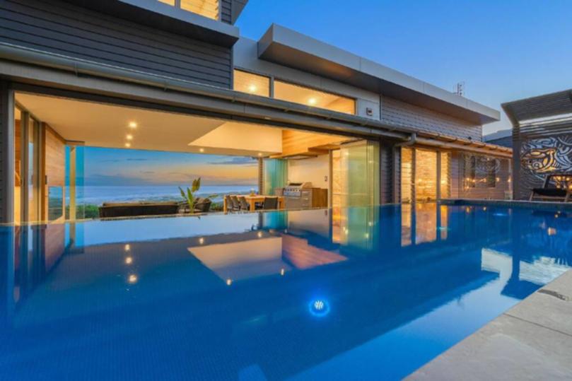 The view from the pool through to the terrace and surrounding beaches.