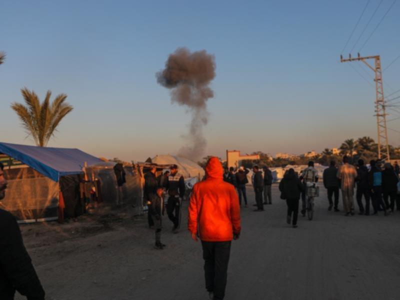 Smoke rises following an Israeli air strike in southern Gaza Strip