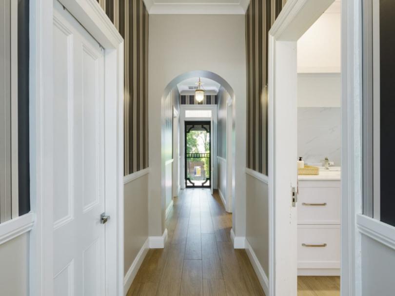 The hallway creates a grand entry.