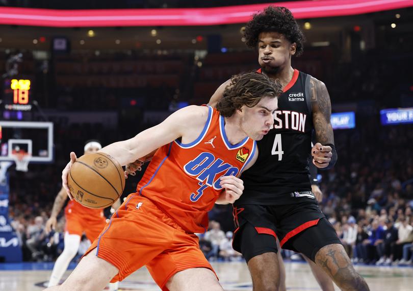 Mar 27, 2024; Oklahoma City, Oklahoma, USA; Oklahoma City Thunder guard Josh Giddey (3) drives to the basket against Houston Rockets guard Jalen Green (4) during the second quarter at Paycom Center. Mandatory Credit: Alonzo Adams-USA TODAY Sports/Sipa USA/AAP Image