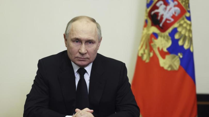 President Vladimir Putin says Russia has "no aggressive intentions" towards NATO states. (AP PHOTO)