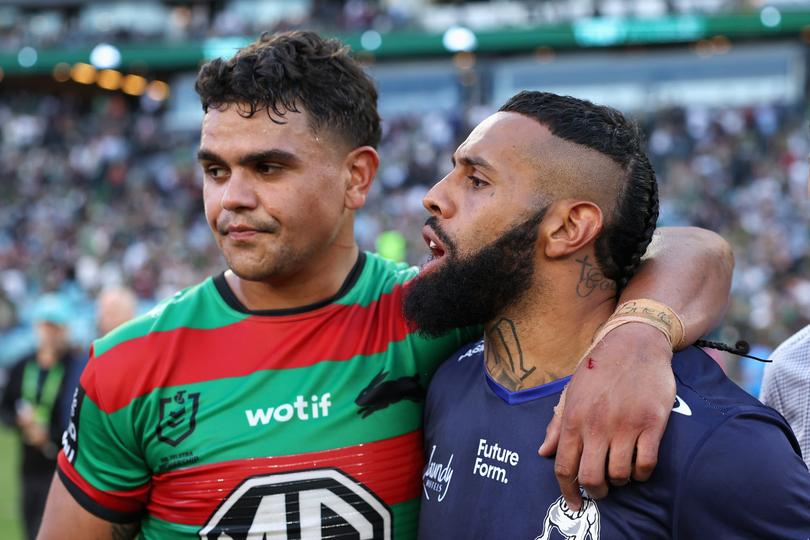 SYDNEY, AUSTRALIA - MARCH 29: Latrell Mitchell of the Rabbitohs and Josh Addo-Carr of the Bulldogs embrace following the round four NRL match between South Sydney Rabbitohs and Canterbury Bulldogs at Accor Stadium, on March 29, 2024, in Sydney, Australia. (Photo by Cameron Spencer/Getty Images)