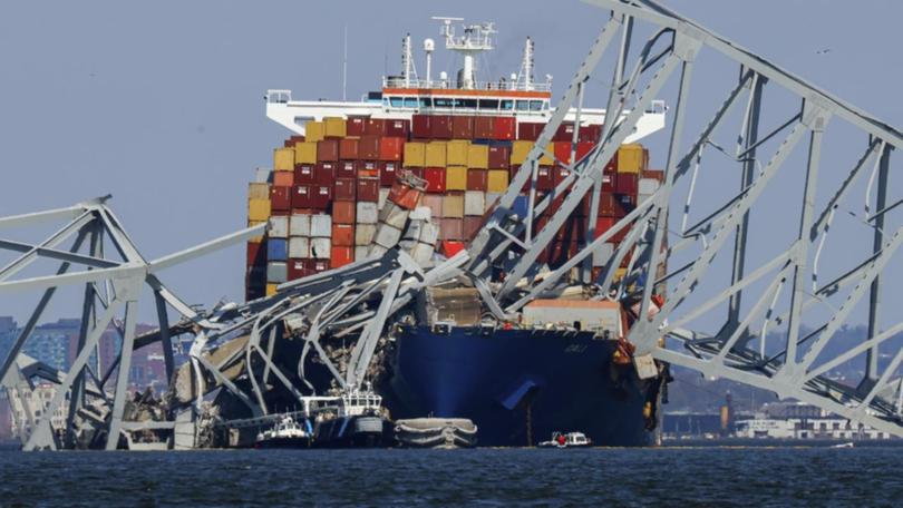 Crews are still working at the site of the collapsed Francis Scott Key Bridge in Baltimore, Maryland (AP PHOTO)