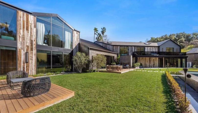 The house is set on 1.4 acres in the Hidden Hills.