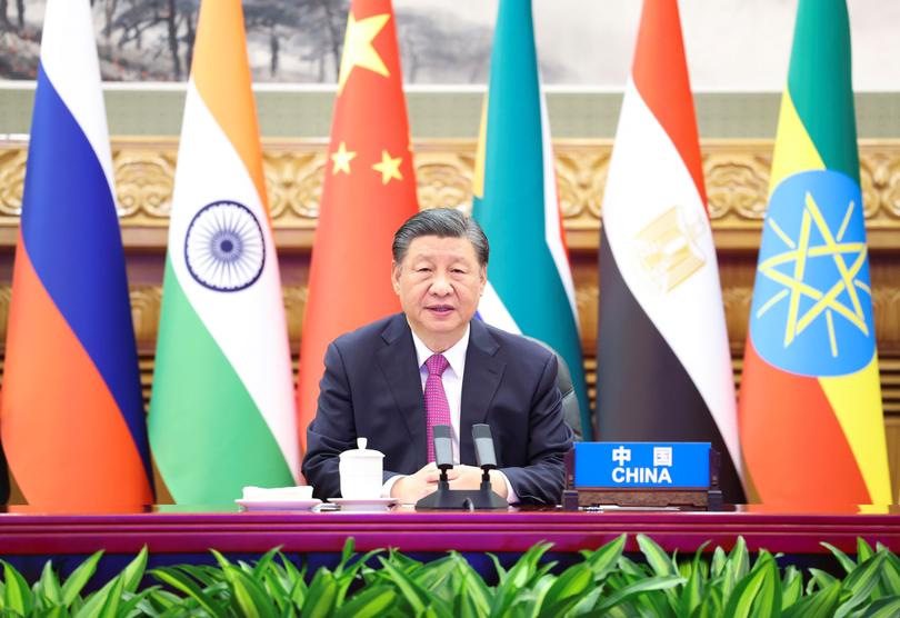 Chinese President Xi Jinping delivers a speech titled "Working Toward a Ceasefire and Realizing Lasting Peace and Sustainable Security" at the extraordinary joint meeting of BRICS leaders and leaders of invited BRICS members on the situation in the Middle East with particular reference to Gaza on Nov. 21, 2023. (Photo by Huang Jingwen/Xinhua via Getty Images)