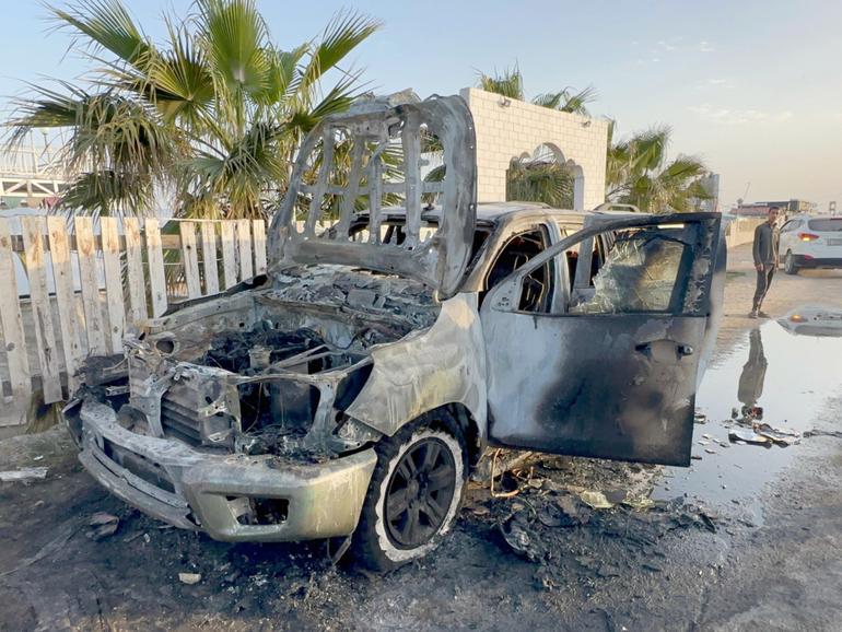 One of the damaged vehicles after the Israeli attack in Deir al-Balah, Gaza.