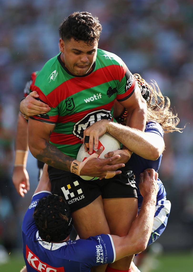 SYDNEY, AUSTRALIA - MARCH 29: Latrell Mitchell of the Rabbitohs is tackled during the round four NRL match between South Sydney Rabbitohs and Canterbury Bulldogs at Accor Stadium, on March 29, 2024, in Sydney, Australia. (Photo by Cameron Spencer/Getty Images)