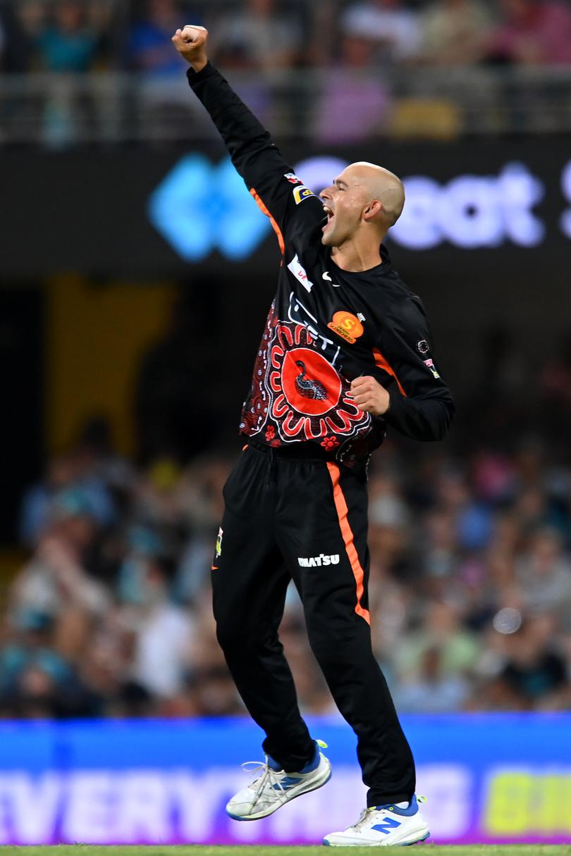 BRISBANE, AUSTRALIA - JANUARY 10: Ashton Agar of the Scorchers celebrates dismissing Paul Walter of the Heat  during the BBL match between the Brisbane Heat and the Perth Scorchers at The Gabba, on January 10, 2024, in Brisbane, Australia. (Photo by Albert Perez/Getty Images)