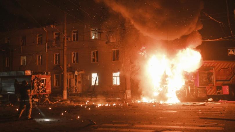 Residential buildings, stores, a medical facility and cars were damaged in the attack on Kharkiv. (AP PHOTO)