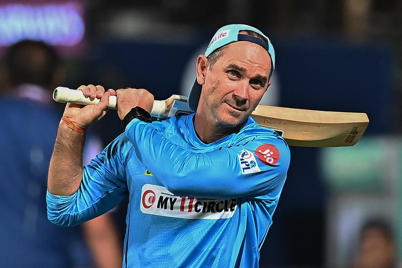 Lucknow Super Giants' coach Justin Langer gestures during the warm up before the start of the Indian Premier League (IPL) Twenty20 cricket match between Royal Challengers Bengaluru and Lucknow Super Giants at the M Chinnaswamy Stadium in Bengaluru on April 2, 2024. 
