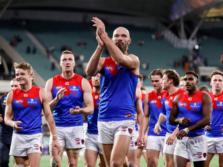 Max Gawn leads his team off the field. 