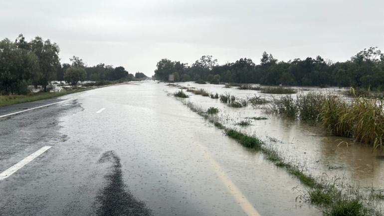 Water over the Newell Highway at Tackinbri Creek following heavy rainfall. 
