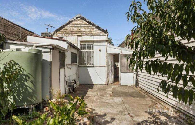 It may be tight but there is a backyard in this inner-city home.