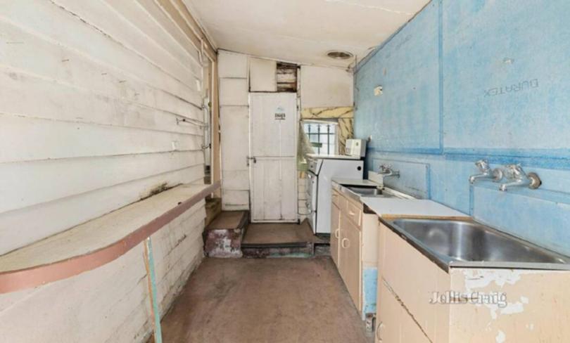 A near-unusable kitchen and a dated frontage giving it zero street appeal, it would seem to be a home that would struggle to find a buyer.