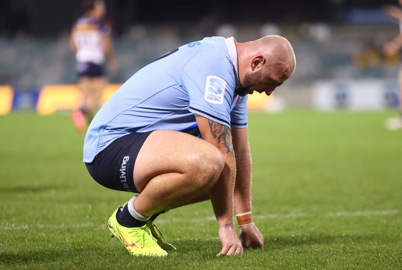 CANBERRA, AUSTRALIA - APRIL 06: Hayden Thompson-Stringer of the Waratahs looks dejected after a Brumbies try during the round seven Super Rugby Pacific match between ACT Brumbies and NSW Waratahs at GIO Stadium, on April 06, 2024, in Canberra, Australia. (Photo by Mark Nolan/Getty Images)