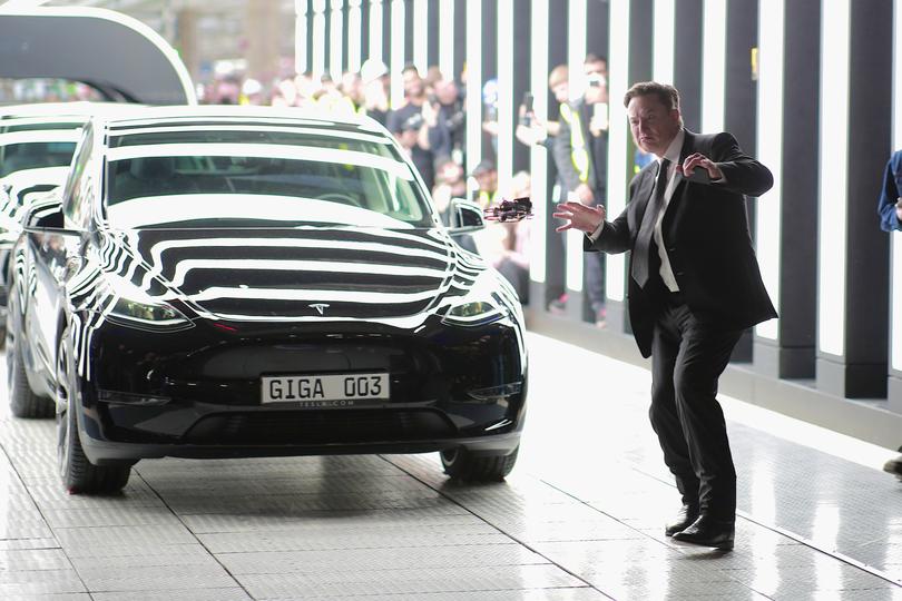 GRUENHEIDE, GERMANY - MARCH 22:  Tesla CEO Elon Musk attends the official opening of the new Tesla electric car manufacturing plant on March 22, 2022 near Gruenheide, Germany. The new plant, officially called the Gigafactory Berlin-Brandenburg, is producing the Model Y as well as electric car batteries. (Photo by Christian Marquardt - Pool/Getty Images)