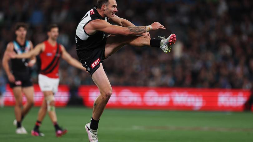 Port Adelaide’s Jeremy Finlayson directed a homophobic slur towards an Essendon player. 