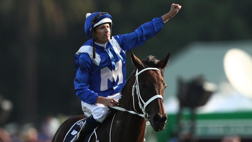 Hugh Bowman riding Winx in 2019.