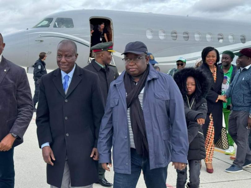 Sierra Leone's President Julius Maada Bio and entourage leaving the plane.