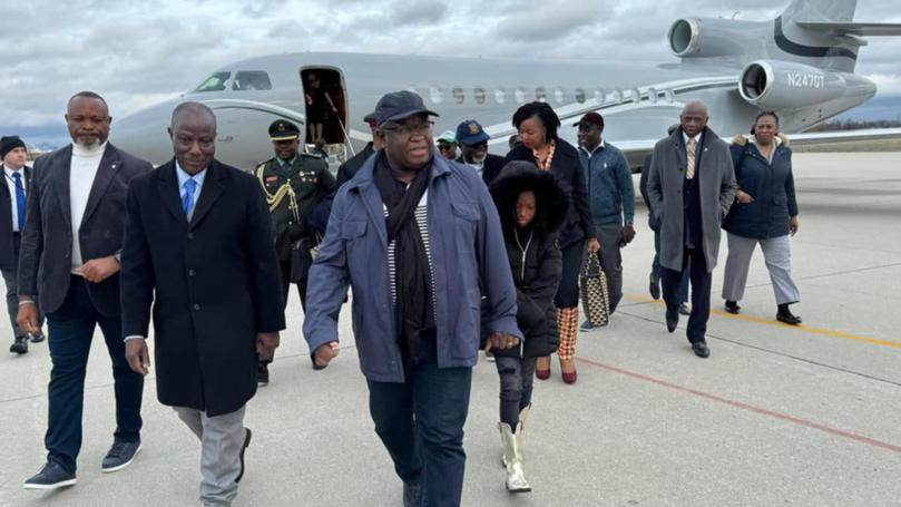 Sierra Leone's President Julius Maada Bio and entourage leaving the plane.